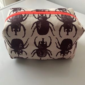 India Hicks Beetle bag in wine. Super cute.